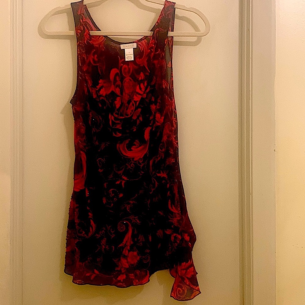 Cache sleeveless black, red and pink blouse with beading.